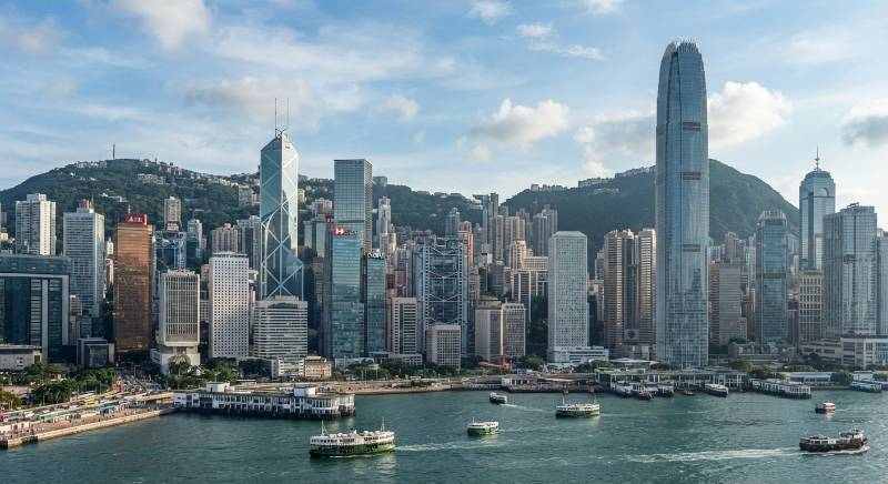 Modern Hong Kong financial district skyline with bank buildings.